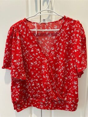 Red and white floral flowy cross-over top